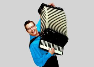 Jordan Rody posing with accordion