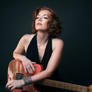 Sue Foley posed with electric guitar