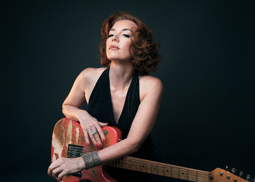 Sue Foley posed with electric guitar