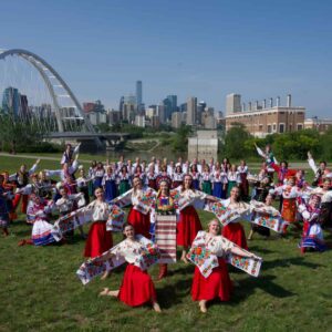 Viter Ukrainian dancers group posing in front of Walterdale Bridge in Edmonton