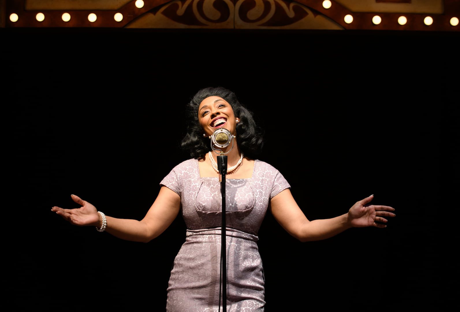 Photo of Krystle Dos Santos performing Hey Viola! stage photo