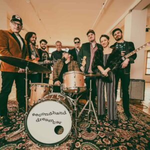 Group photo of Secondhand Dreamcar in empty building loft room